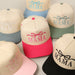 MAMA Ribbon Embroidered Two-Tone Trucker Hat Fashion City