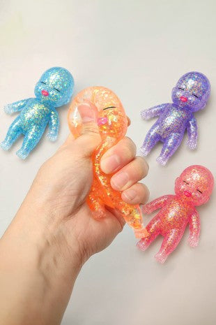 Glittered doll squishy toy