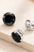 925 Sterling Silver Round Studs Black on cream stone background