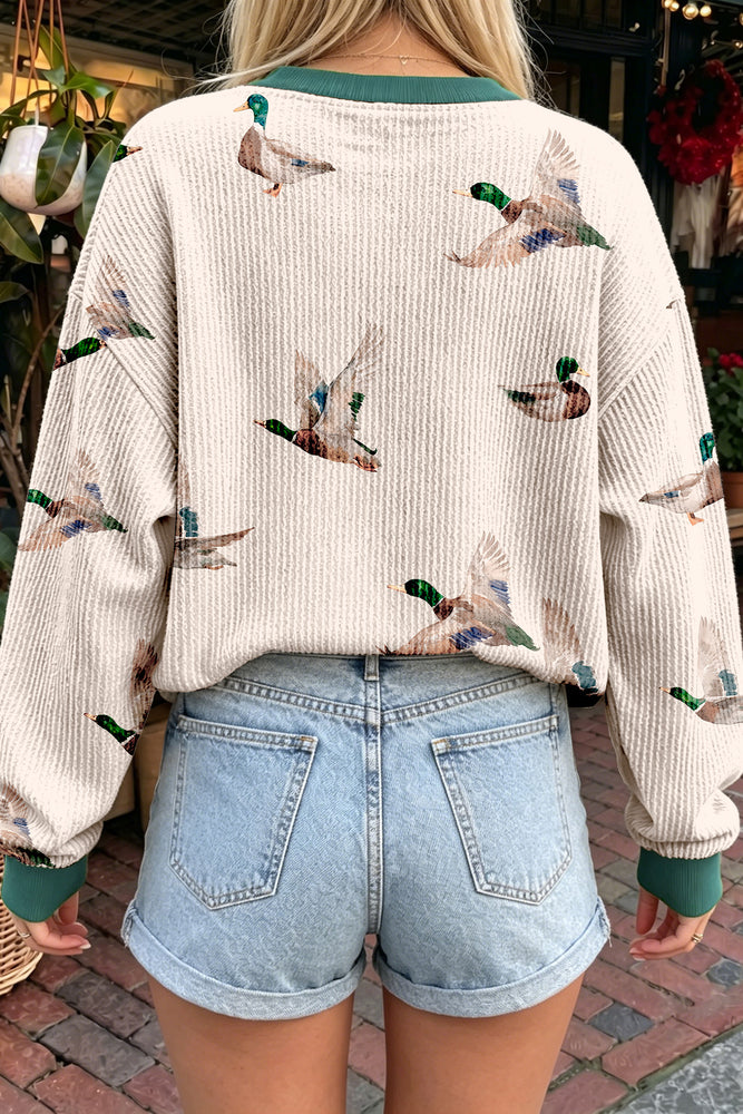 Beige duck print pullover top view 2