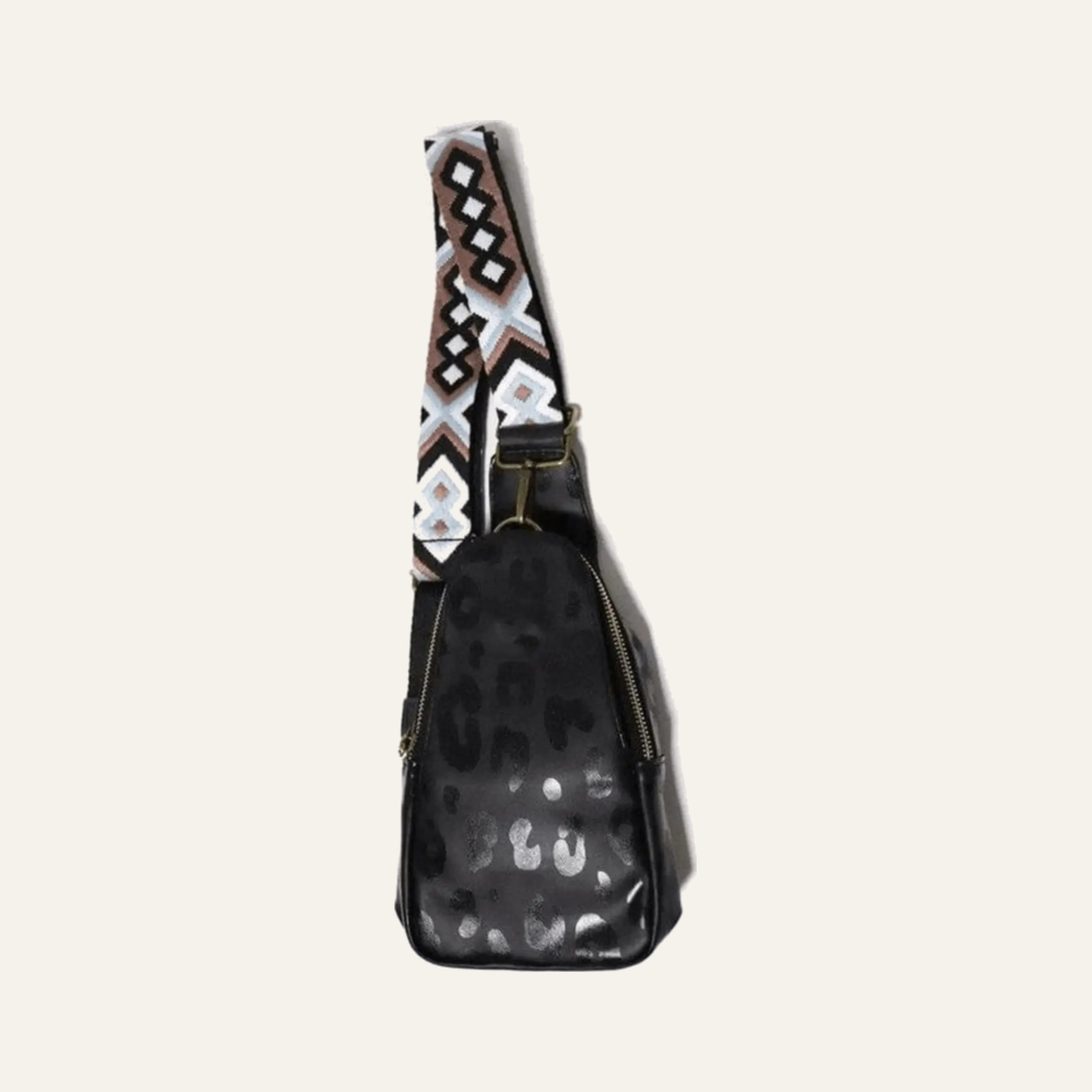 Aztec strap leopard print crossbody sling bag on soft white background