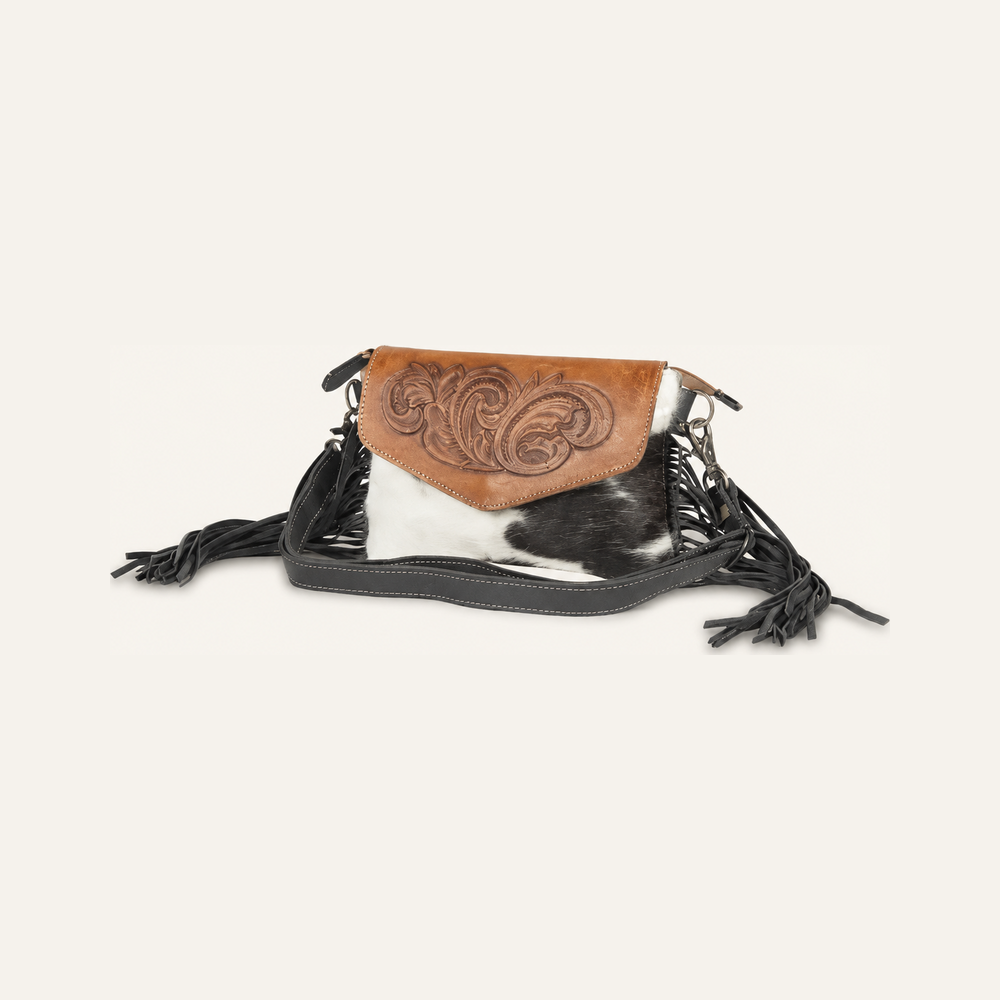 Anam Cara Hand-Tooled Mayra Bag on soft white background