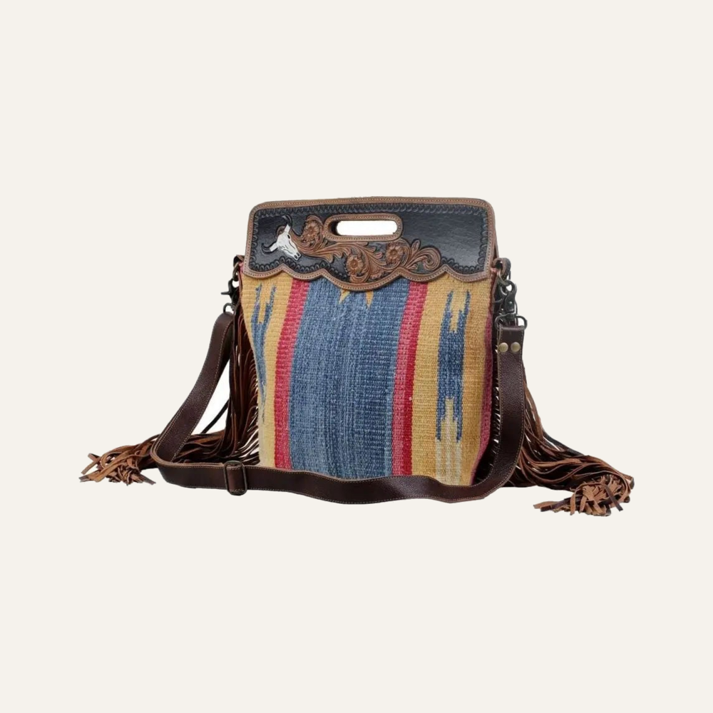 Blue Stream Hand-Tooled Bag on soft white background