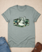 Camo Flying Mallard Duck T-Shirt flat lay