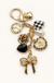 Bow Checker Heart Flower Bag Charm on soft-white background