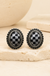 Checker Oval Post Earrings on cream stone display