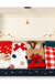 Santa Christmas fuzzy socks four-pack gift box on white background