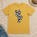 Cow Pattern Cactus T-shirt flat lay