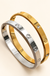 Gold and Silver Clover Bangles on soft-white background
