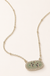 Green Duck Necklace on soft-white background