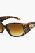 Sunglasses on soft white background