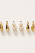 Huggie Pearl Gold Hoop Earrings Trio Set on soft-white background
