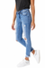 Mid rise hem detail ankle skinny jeans — white background view 1