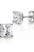 Pair of silver square clear CZ stud earrings on white background
