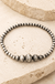 Navajo Stretch Bracelet on cream stone background