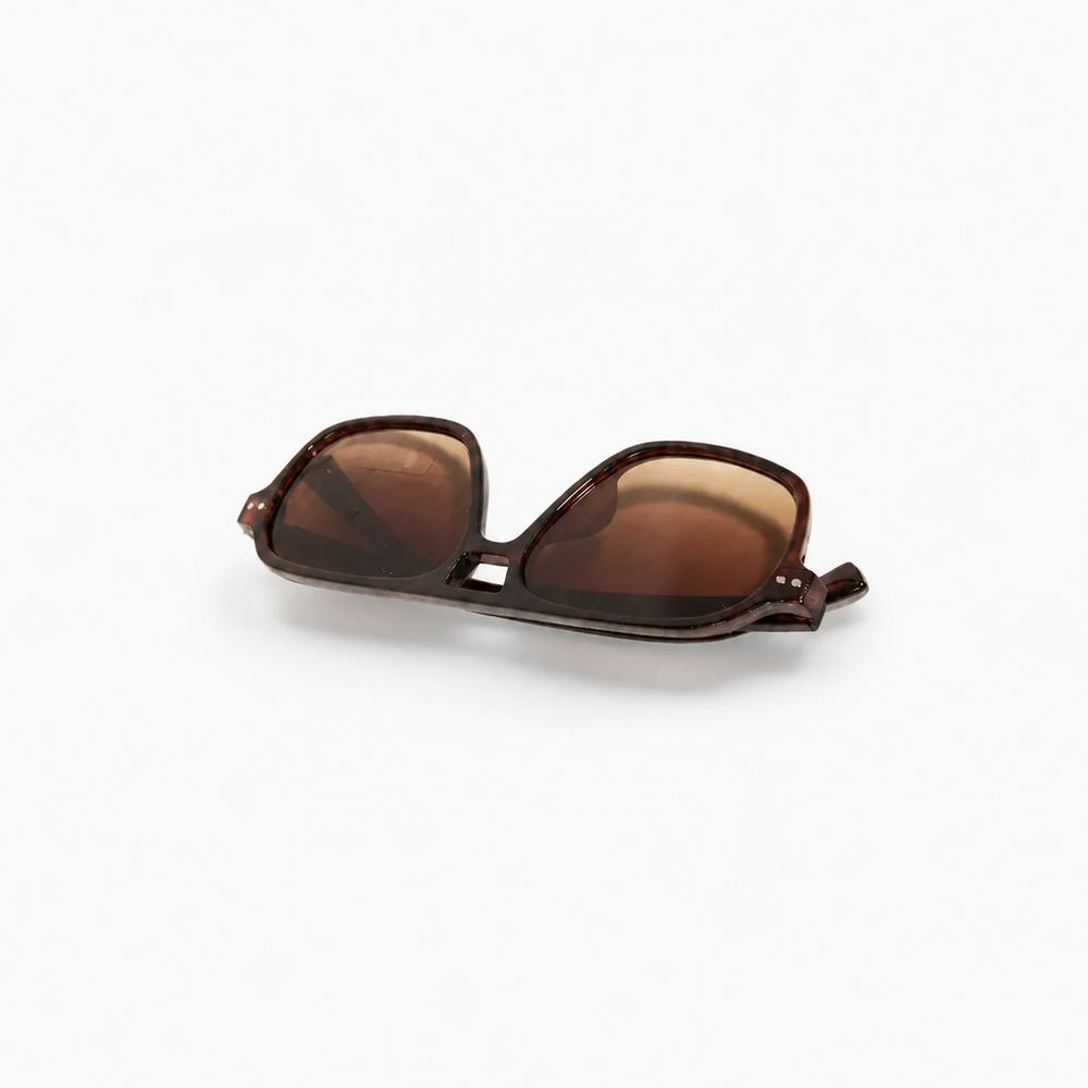 Sunglasses on soft white background