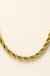 Gold stainless steel 5mm rope chain on ivory background
