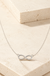 Sterling Silver Infinity Sign Necklace on cream stone background