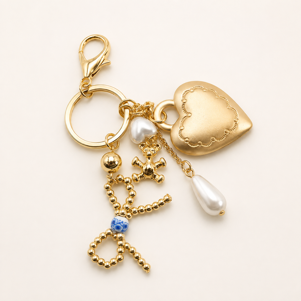Porcelain Bow Heart Teddy Bear Bag Charm on soft-white background