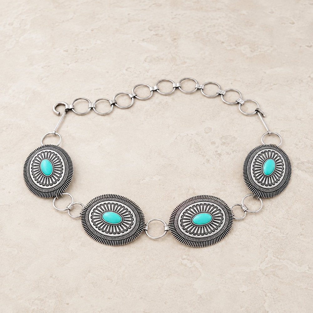 Texture Western Concho Oval Gem Stone Chain Belt on cream stone
