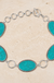 Textured Oval Gemstone Chain Belt on cream stone