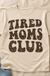 Tired Moms Club T-shirt flat lay