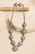 Western Concho Flower Navajo Pearl Necklace Set on cream stone background