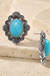 Western Concho Gemstone Flower Stud Earring on cream stone background