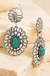 Western Concho Textured Flower Gemstone Earring on cream stone display