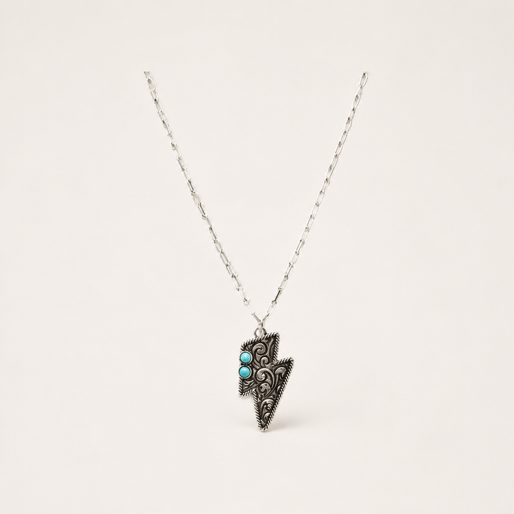 Western Etched Thunderbolt Necklace on soft-white background