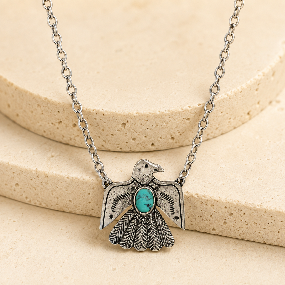 Western Textured Thunderbird Gemstone Necklace on cream stone display