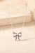 Western Turquoise Ribbon Necklace on cream stone display