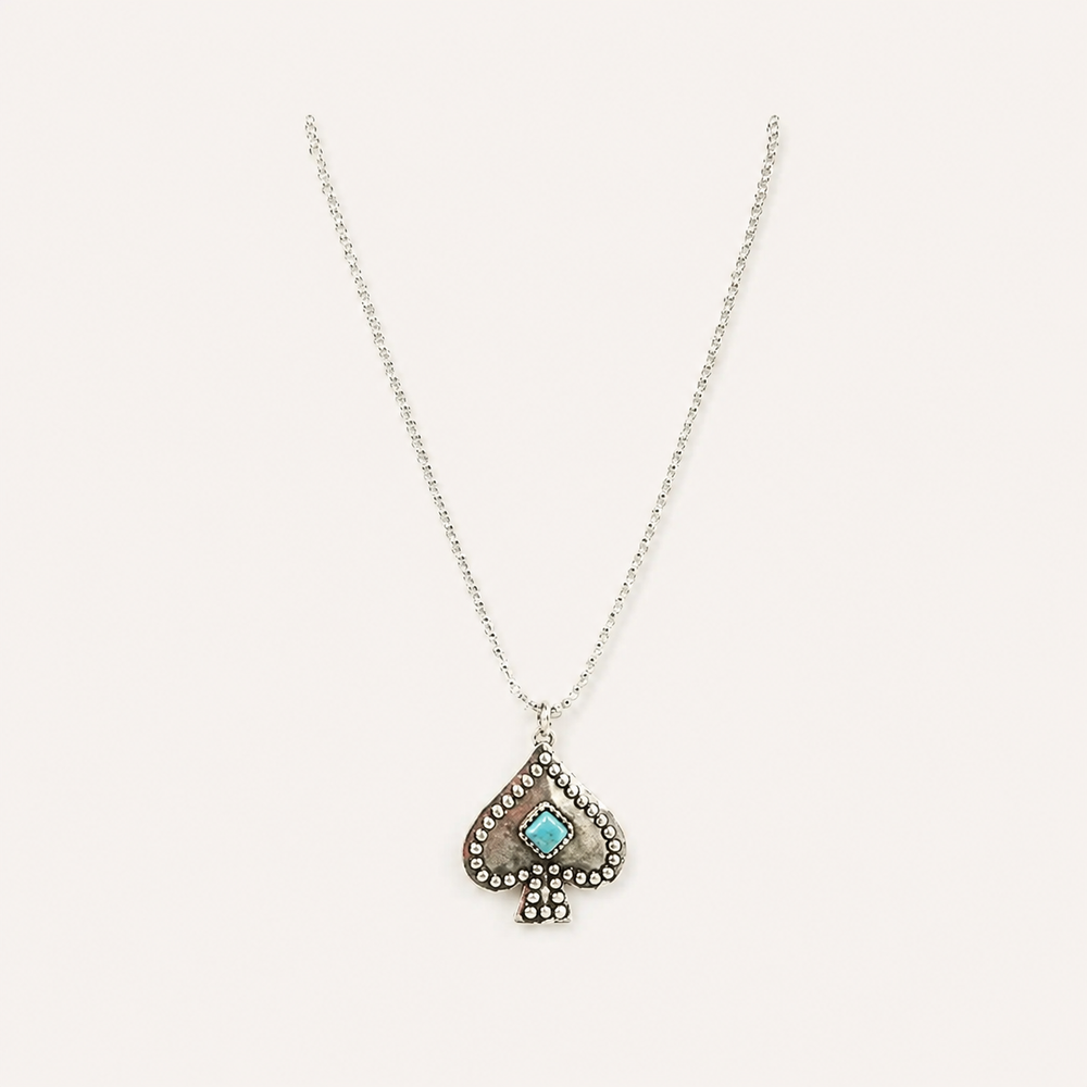 Western Turquoise Stone Spade Necklace on soft-white background