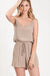 Textured solid color spaghetti strap jumpsuit with drawstring waist. LECCE