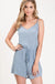 Textured solid color spaghetti strap jumpsuit with drawstring waist. LECCE