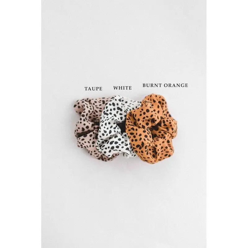 Coletero con estampado de leopardo y lunares