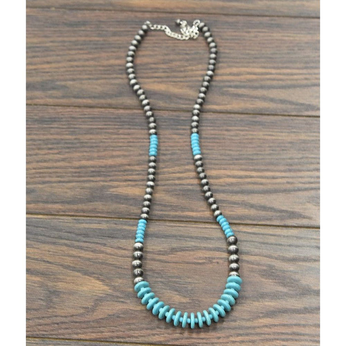 Graduated bead and navajo pearl necklace