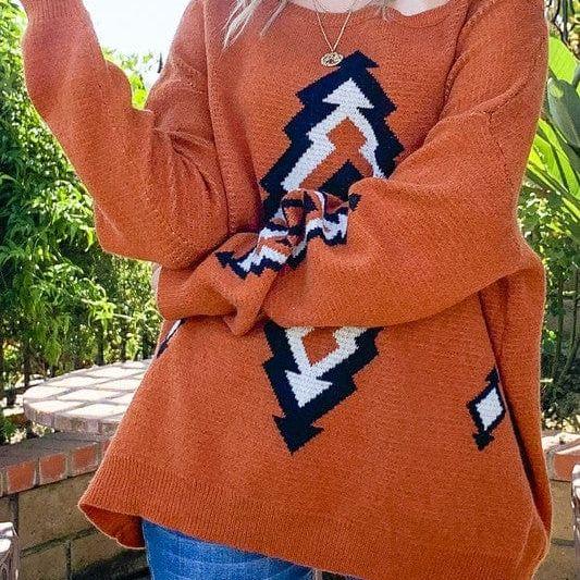 Suéter con estampado azteca