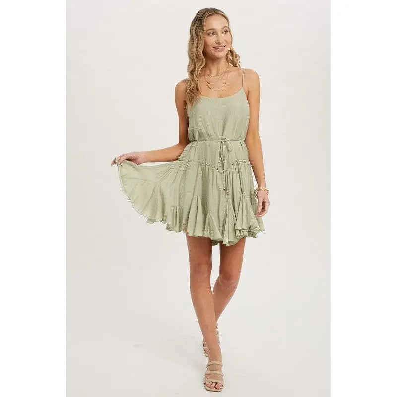 Vestido camisero con vuelo y volantes