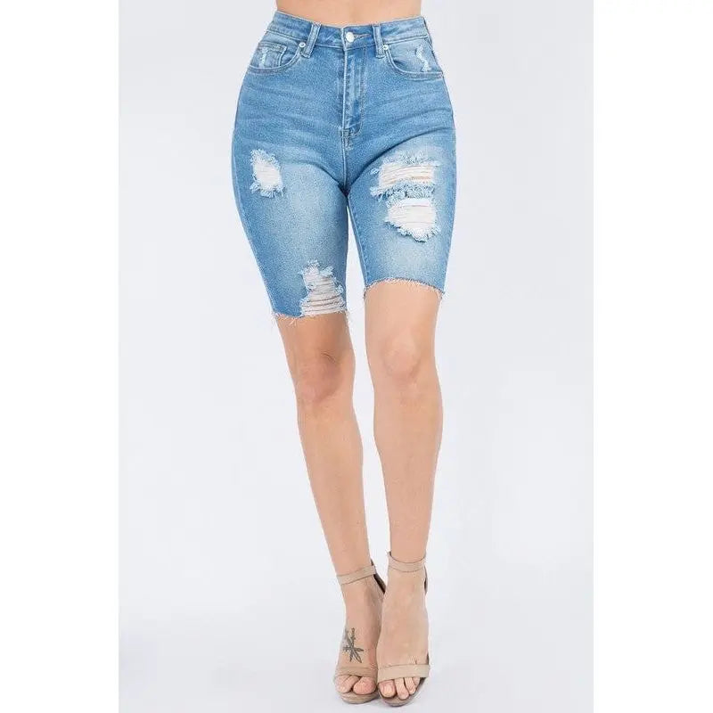 Bermudas ajustadas de mezclilla desgastada