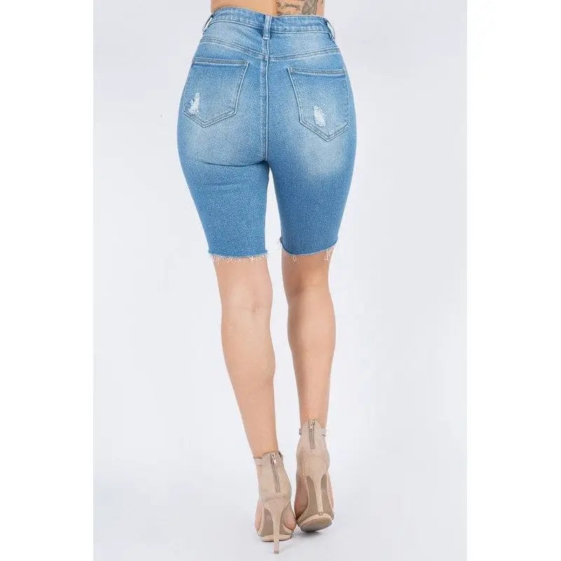 Bermudas ajustadas de mezclilla desgastada