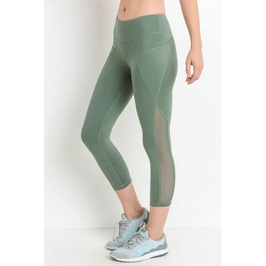 Leggings capri con bolsillo superpuesto de malla