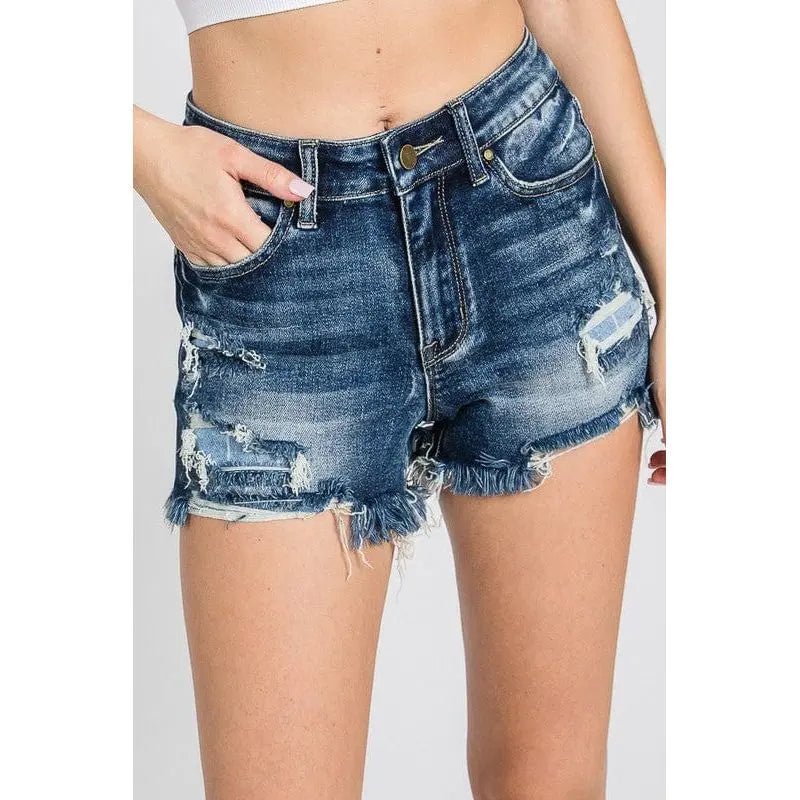 Shorts elásticos de talle alto con parches y dobladillo deshilachado