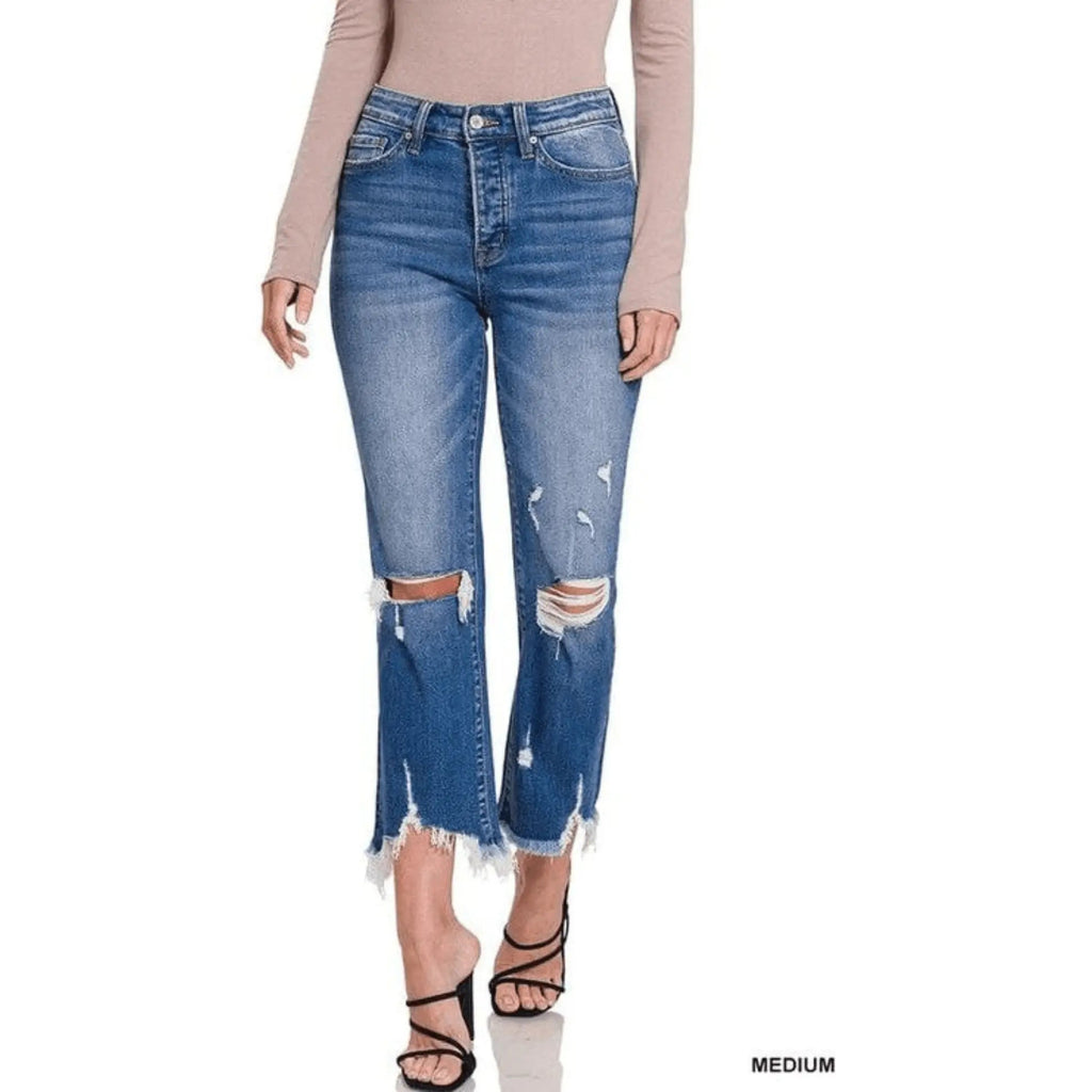 Pantalones de mezclilla recortados con corte de bota desgastados y tiro medio